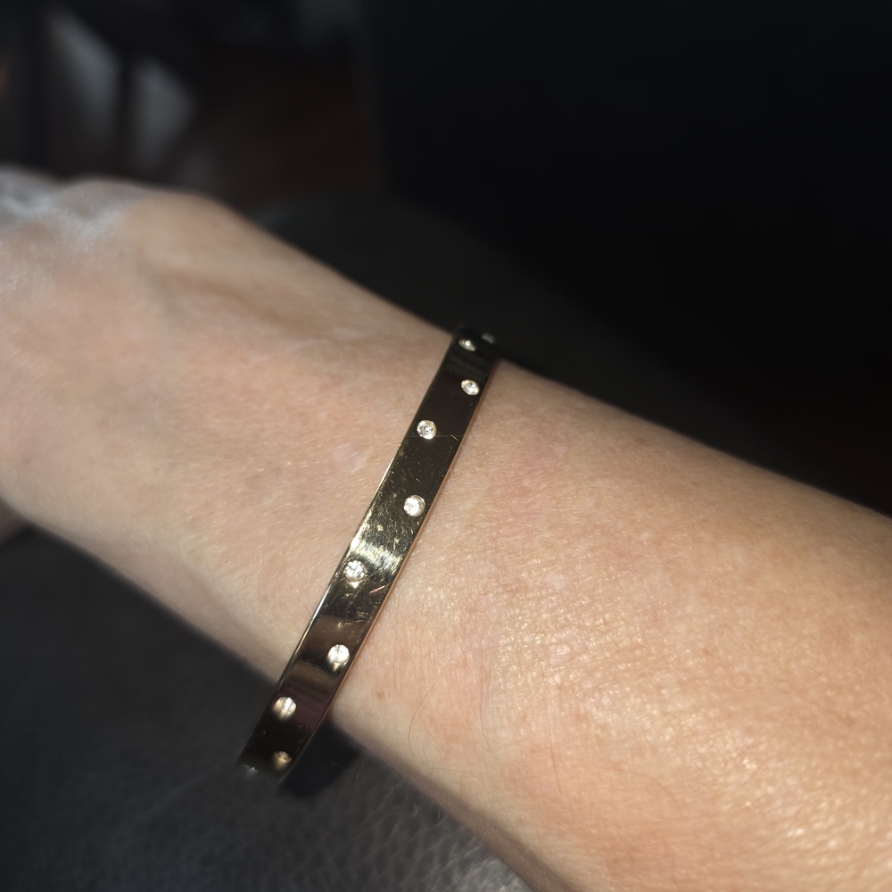 Elegant Gold Bracelet with CZs.